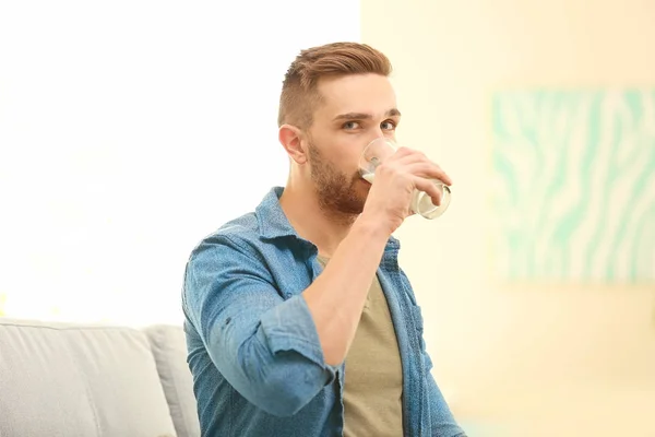 Man drinking milk — Stock Photo, Image