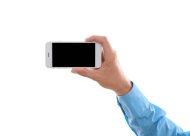 El ele tutuşan akıllı telefon.