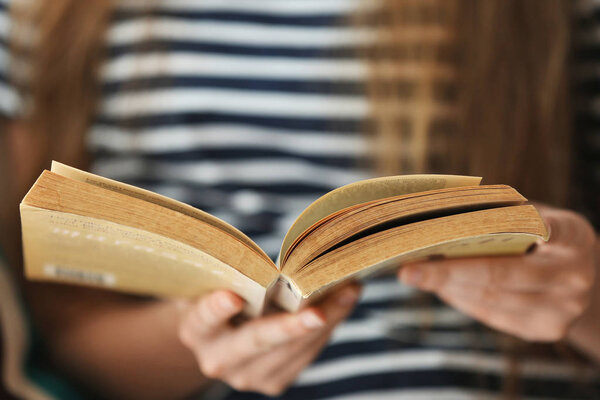 Woman reading book 