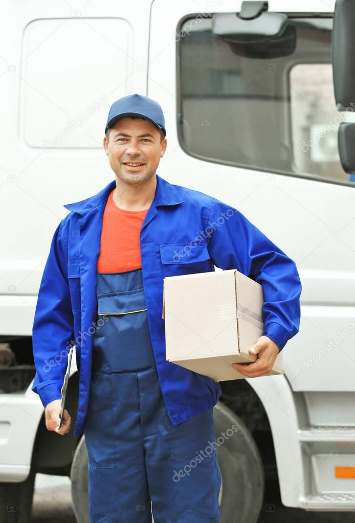 Delivery concept. Postman with car