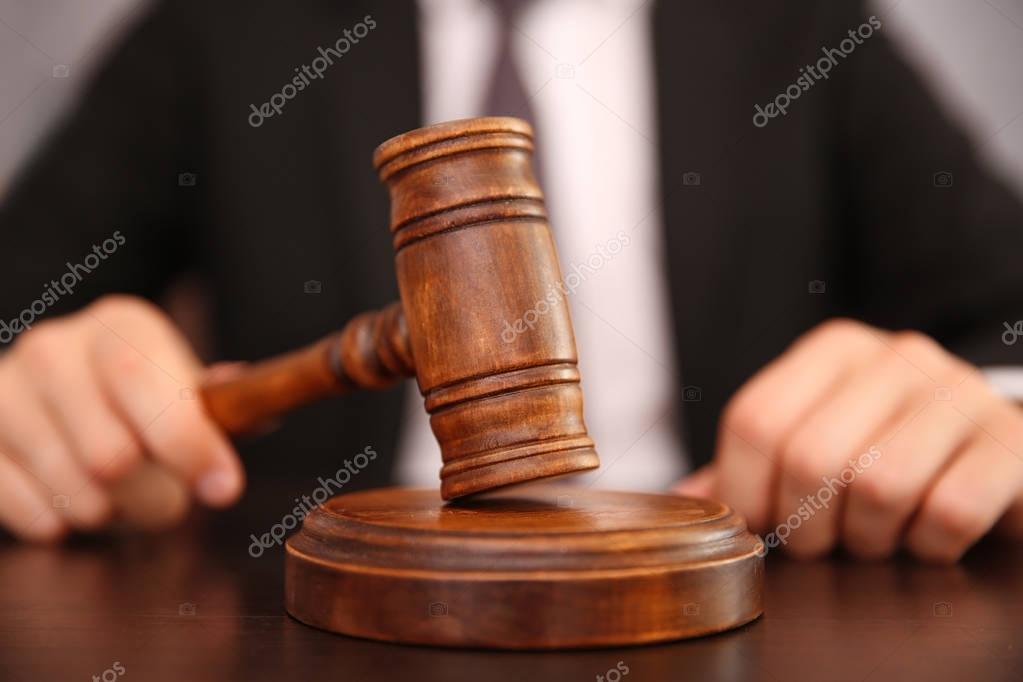 Court hammer on table — Stock Photo © belchonock 130399014