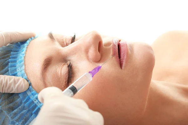 Procedure of lips augmentation with hyaluronic acid injection — Stock Photo, Image