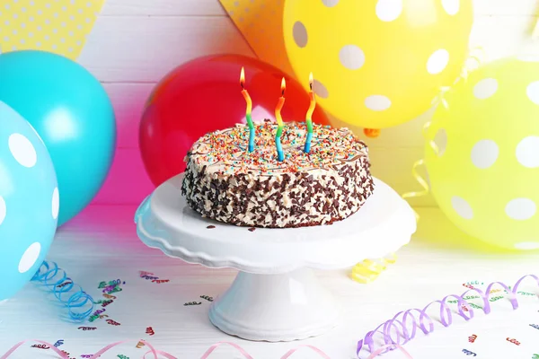 Birthday cake on balloons — Stock Photo, Image