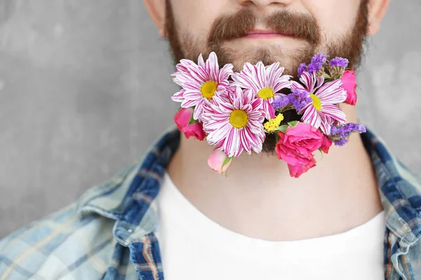 Man with beard of flowers — Stock Photo, Image