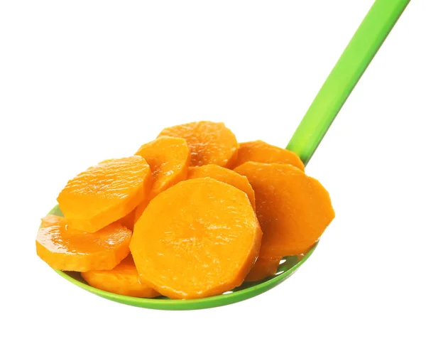 Chopped carrot in spoon — Stock Photo, Image