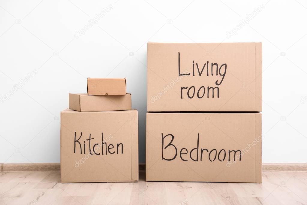 Empty room with moving boxes 
