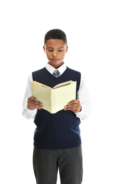 Niedlicher Teenager mit Buch auf weißem Hintergrund — Stockfoto