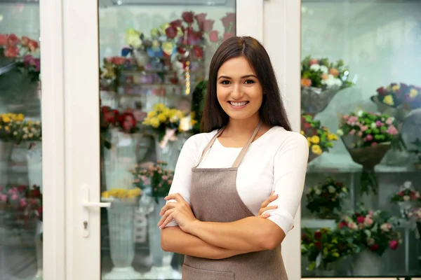 Pretty young florist — Stock Photo, Image