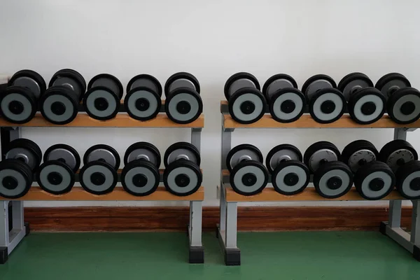 Dumbbells in fitness club — Stock Photo, Image