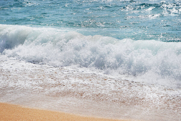 Warm sand and sea waves