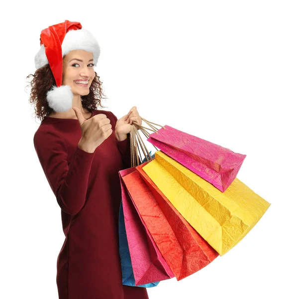 Lycklig kvinna som håller i shoppingväskor — Stockfoto