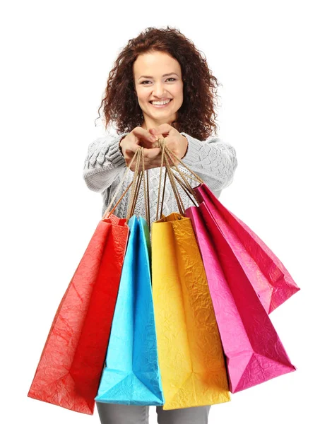Mulher feliz segurando sacos de compras — Fotografia de Stock