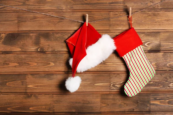 Stocking and Santa Claus hat — Stock Photo, Image