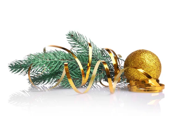 Bauble, coniferous branch and ribbon — Stock Photo, Image