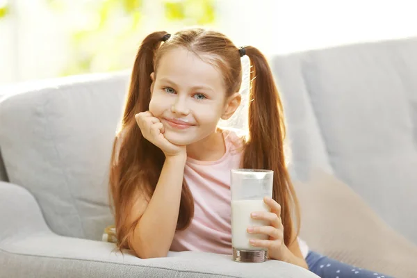 Little girl with glass of fresh milk — Stock Photo, Image