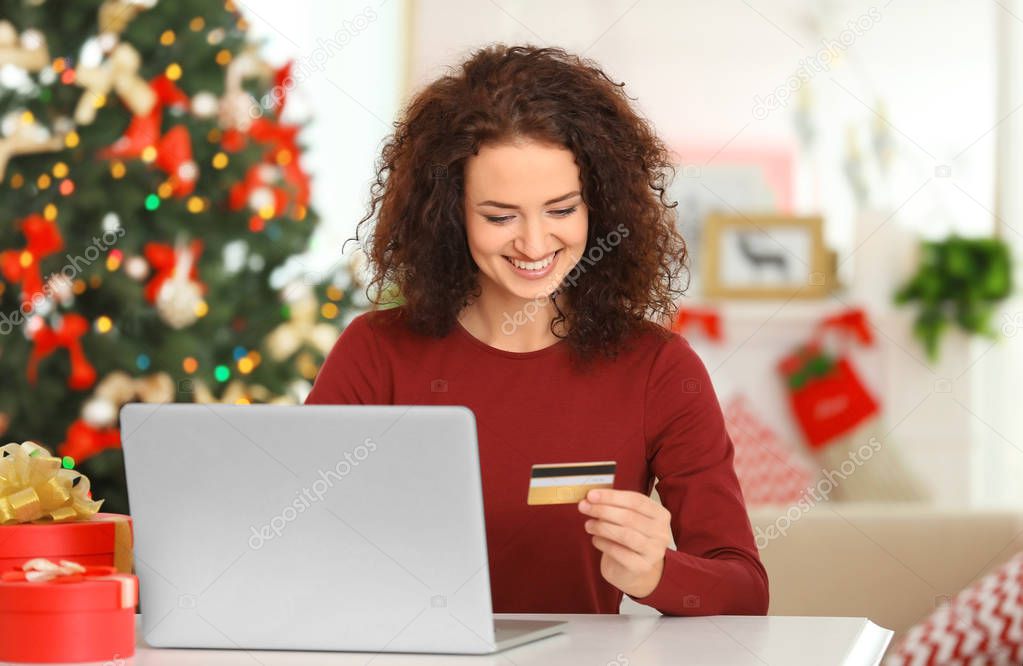 Young woman ordering Christmas gifts