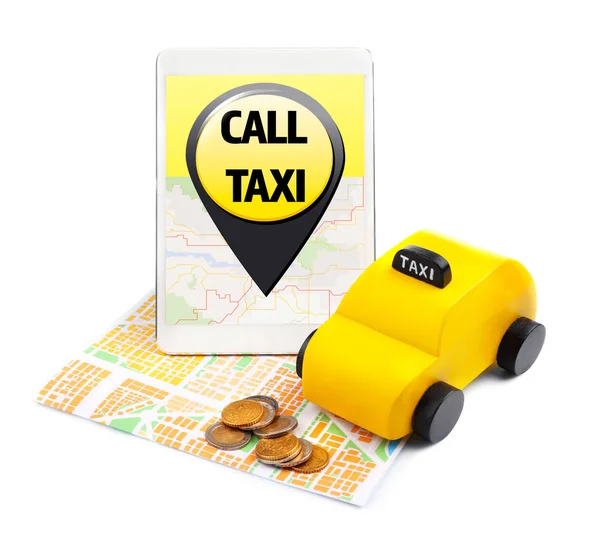 Такси с жёлтыми игрушками — стоковое фото