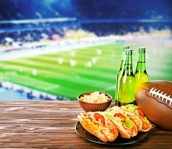 Beer with snack and ball — Stock Photo, Image