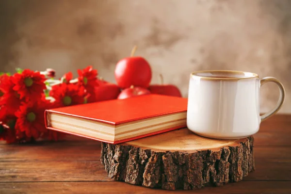 Red book with cup of coffee