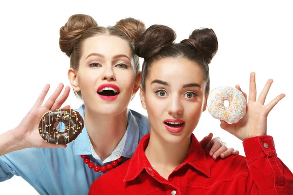 Women with tasty donuts — Stockfoto