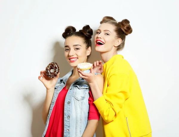 Women with tasty donuts — 스톡 사진