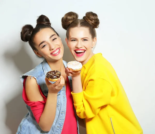 Women with tasty donuts — 스톡 사진