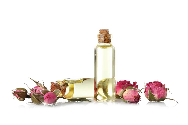 Flaskor med aromaolja med rosor — Stockfoto