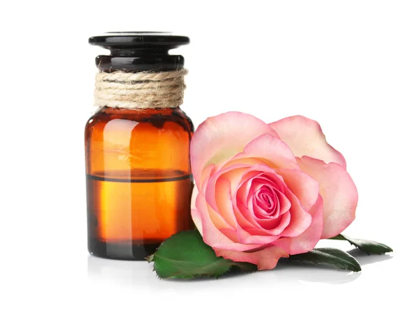 Botella de aceite de aroma con rosa — Foto de Stock