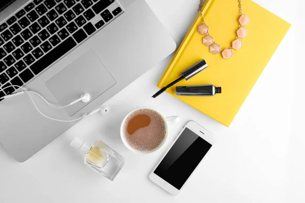 Workplace with laptop and women accessories — Stock Photo, Image