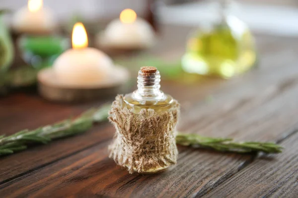 Bottle of rosemary essential oil — Stock Photo, Image