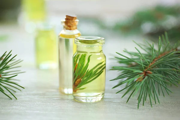 Bottles of pine essential oil — Stock Photo, Image