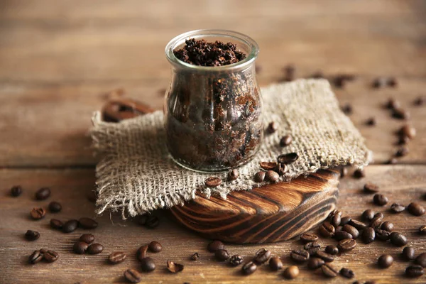 Coffee body scrub in glass jar — Stock Photo, Image