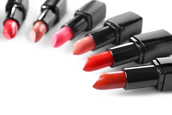 Assortment of lipsticks in row — Stock Photo, Image