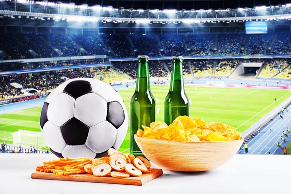 Beer with snack and ball — Stock Photo, Image