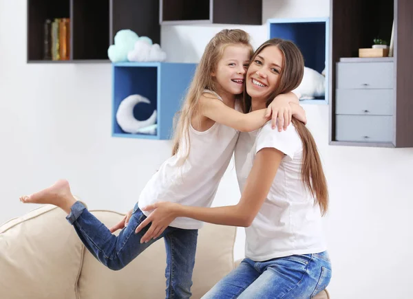 Cute girl with mother — Stock Photo, Image