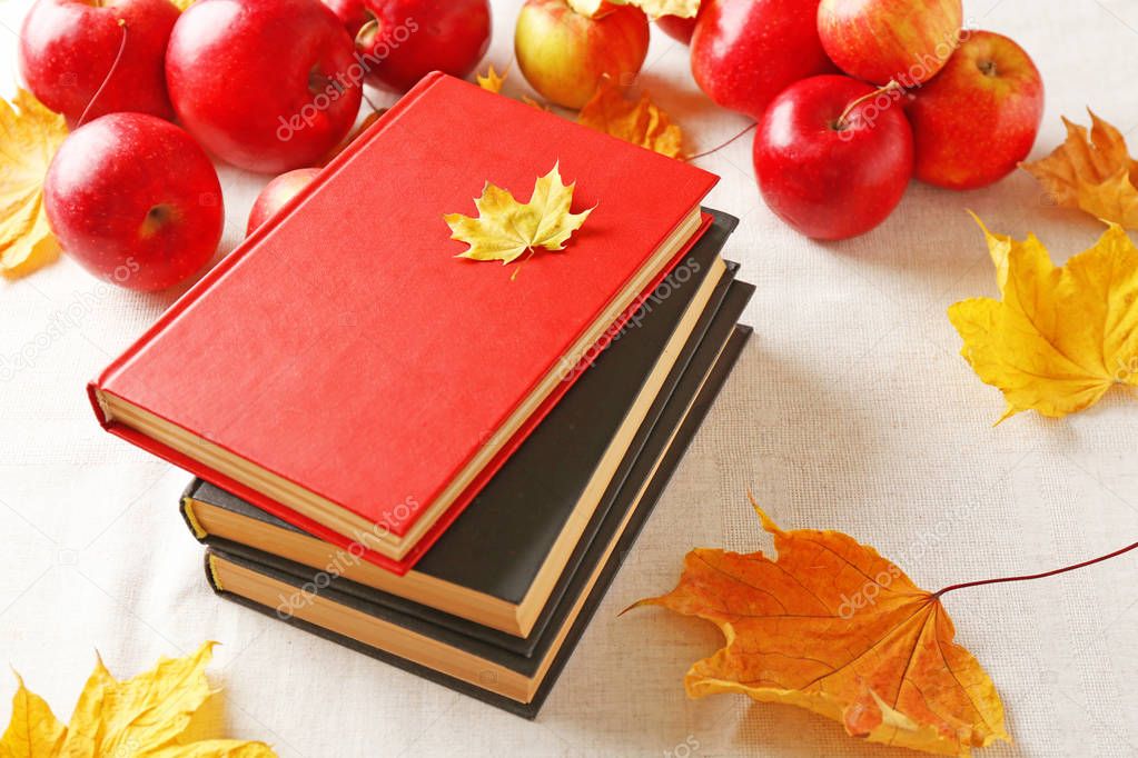 Closeup of books and apples