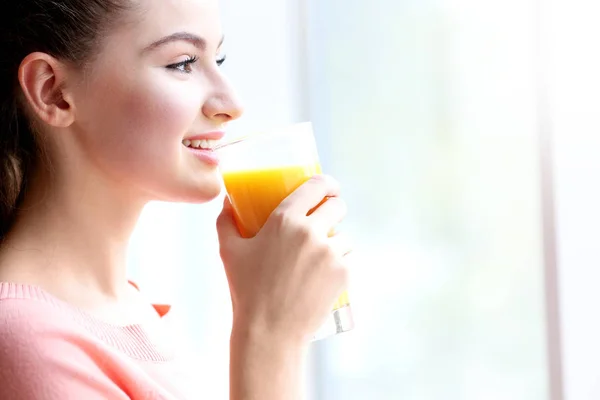 Beautiful  woman drinking juice — Stock Photo, Image