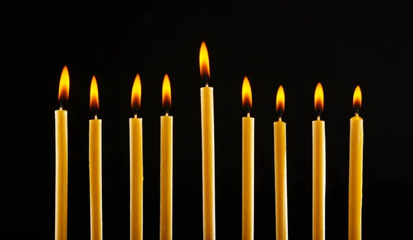 Nove velas acesas — Fotografia de Stock