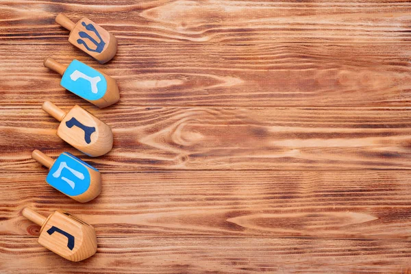 Dreidels for Hanukkah on table — Stock Photo, Image