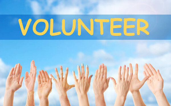 Руки и слово VOLUNTEER
 