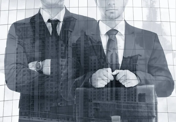 Double exposure of men and building background. Business concept. Black and white photo.