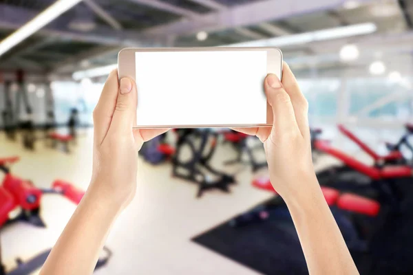 Vrouwelijke handen met smartphone — Stockfoto