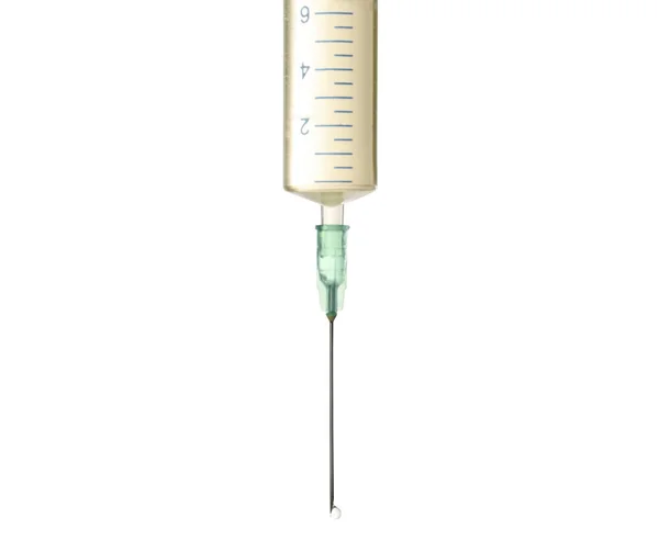 Syringe met vloeistof op witte achtergrond — Stockfoto
