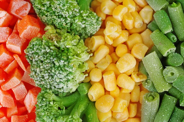 Mélange de légumes congelés fond — Photo