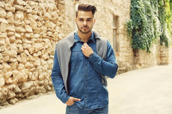 Handsome man near old building — Stock Photo, Image