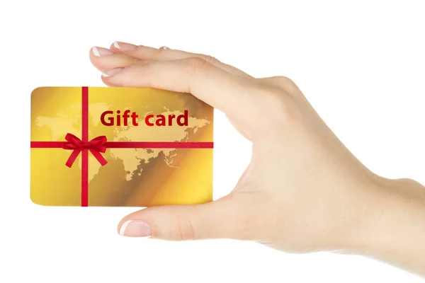 Vrouwelijke hand met gift card op witte achtergrond. Concept voor vakantie vieren. — Stockfoto