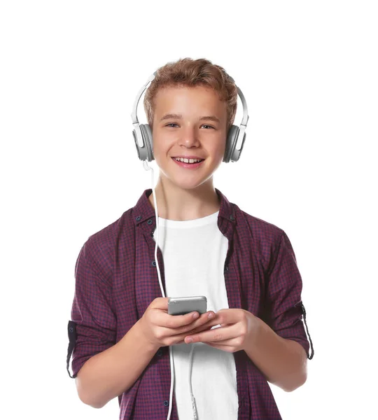 Niño escuchando música sobre fondo claro — Foto de Stock