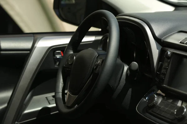 Steering wheel in car interior — Stock Photo, Image