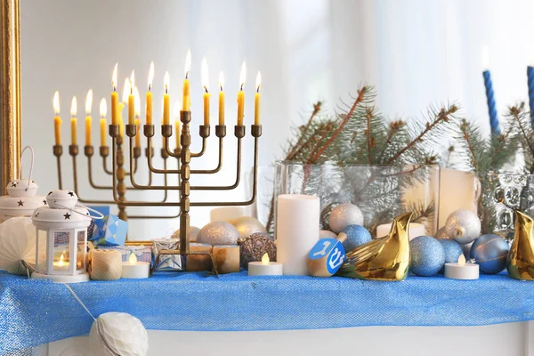 Menorah and decorative elements near mirror. Hanukkah concept — Stock Photo, Image