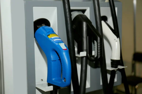 Electric car chargers at station